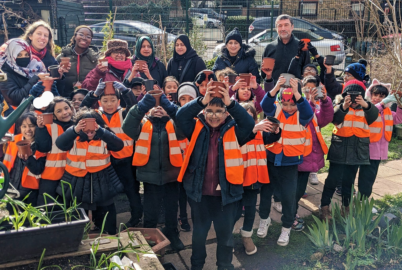 image of a group of school children in high vis